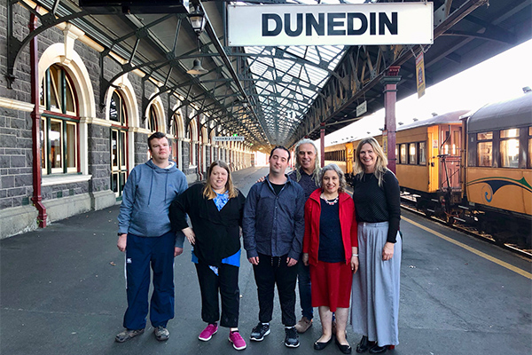 Photo of group from Donald Beasley Institute at Dunedin Train Station